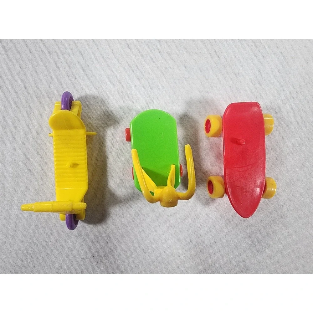 Vintage 1980s McDonalds Happy Meal Lot Garfield Muppet Babies Scooter Skateboard